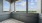 Private balcony with city views and outdoor seating at The Birney Apartments