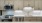 Contemporary kitchen with stainless steel appliances and quartz countertops at The Birney Apartments