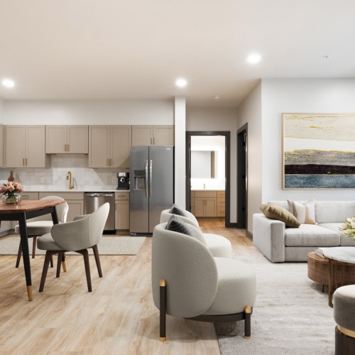 Generous living spaces to relax and unwind living room with seating tables and windows