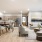 living room with seating tables and windows