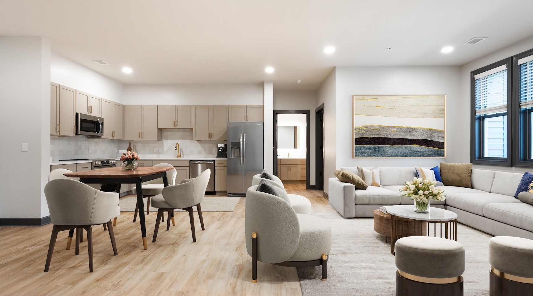 Generous living spaces to relax and unwind living room with seating tables and windows